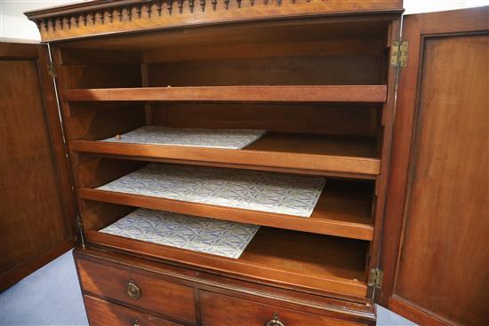 A George III Hepplewhite period mahogany dwarf linen press W. 3ft 9in. D.1ft 10in. H.5ft 6in.